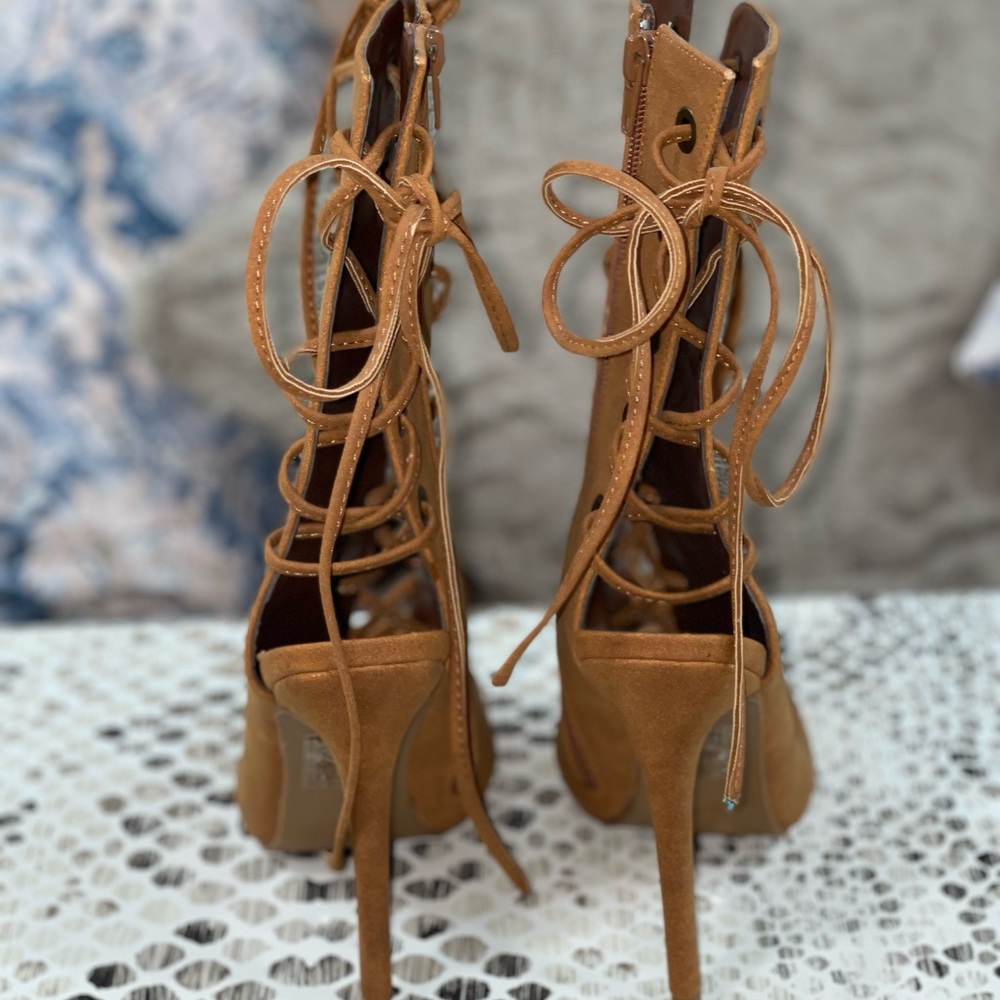 Lace up peep toe suede booties. Excellent condition